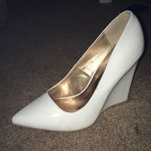White Pointy Toed Wedged Heel